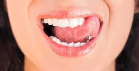 Understanding the Risks and The Impact of Oral Piercing on Oral Health