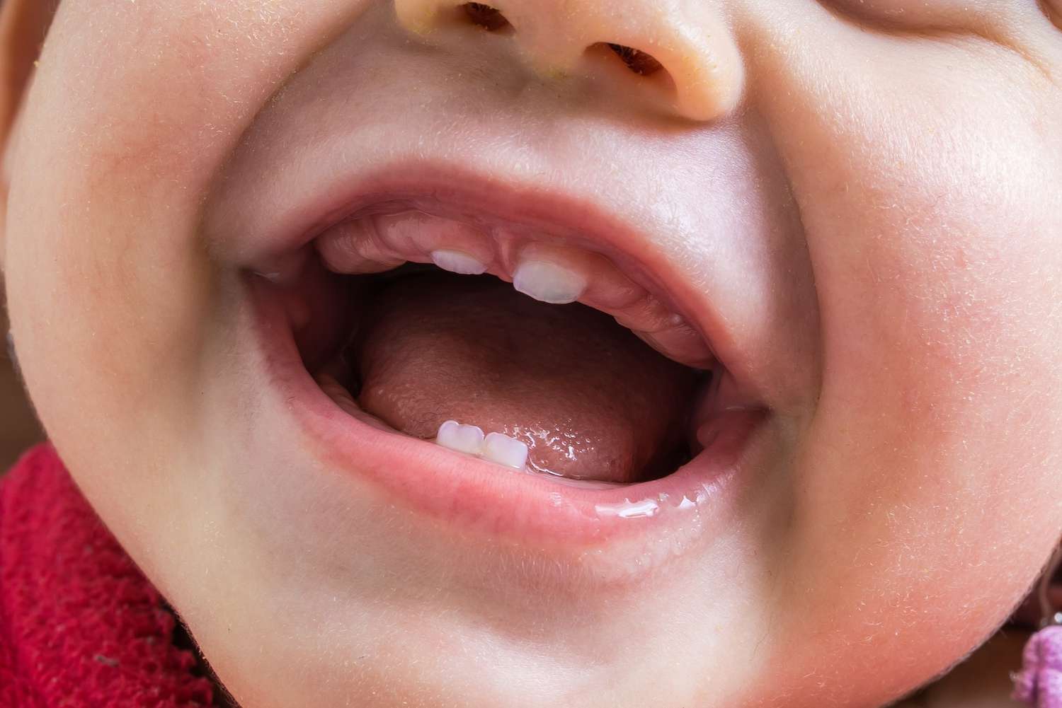6 Symptoms of Teething and Caring for a Teething Baby