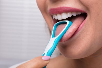 7 Reasons Why Cleaning and Brushing Your Tongue is Important for Oral Health