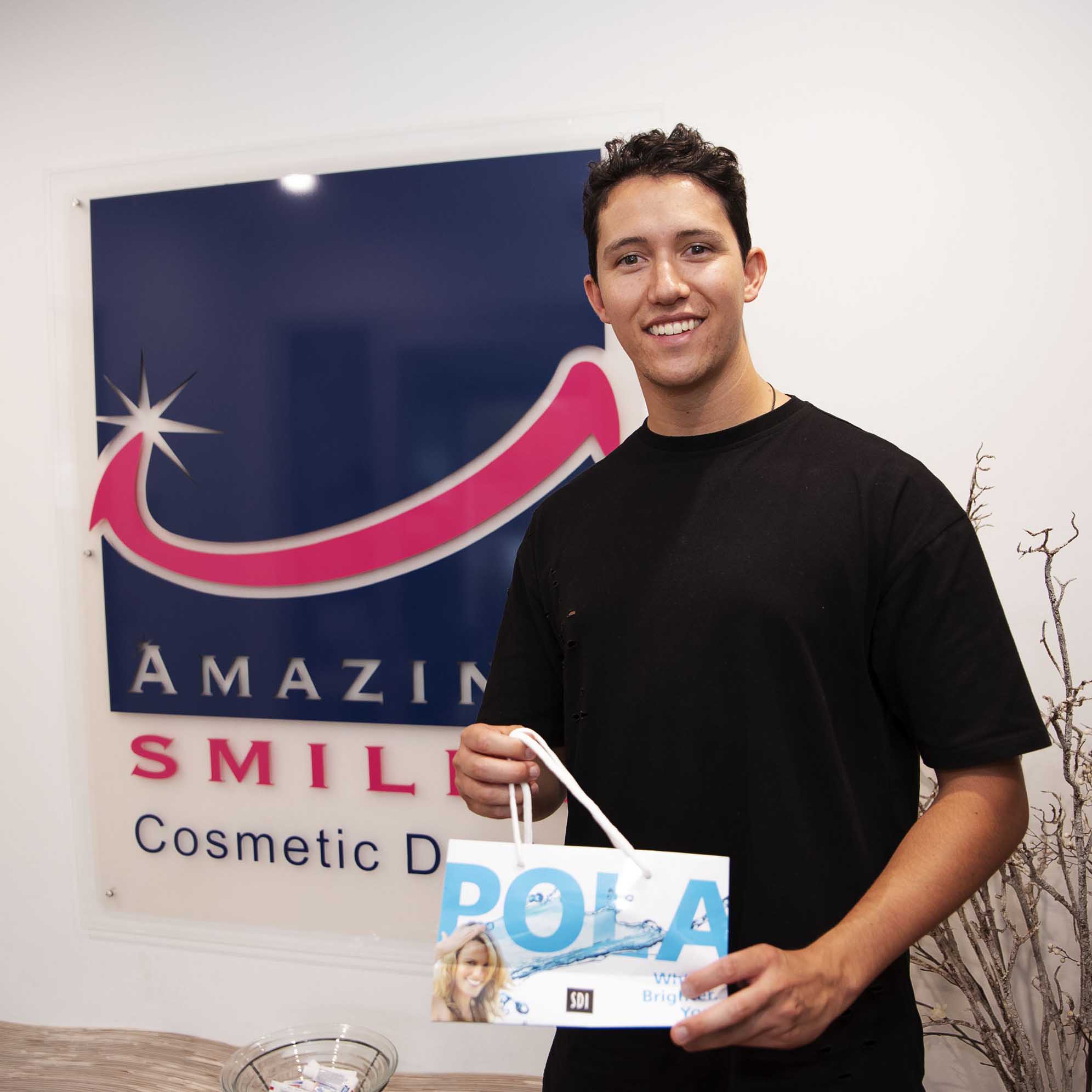 Amazing Smiles Dentist Gold Coast - DJ Fletcher Kirkman with his Pola Smile Teeth Whitening Take Home Kit